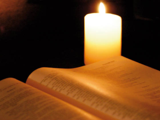 Bible-by-candlelight.jpeg